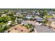This home is in a quiet neighborhood, lush landscaping, and well-maintained homes at 1736 N Ashbrook Cir, Mesa, AZ 85213