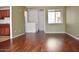 Inviting living room featuring sleek hardwood floors and neutral paint at 18250 N Cave Creek Rd # 123, Phoenix, AZ 85032