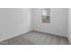 Bedroom with one window and neutral carpeting at 21845 E Bonanza Ct, Queen Creek, AZ 85142