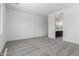 Spacious bedroom leading into a bathroom with dark cabinets at 21845 E Bonanza Ct, Queen Creek, AZ 85142