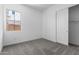 Bedroom with one window and neutral carpeting at 21845 E Bonanza Ct, Queen Creek, AZ 85142