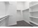 Walk-in closet with shelving and a clothes bar at 21845 E Bonanza Ct, Queen Creek, AZ 85142