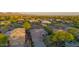 An aerial view displays the house in a neighborhood setting with scenic mountain views at 22847 N 53Rd E St, Phoenix, AZ 85054