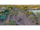 Bird's-eye view of a desert community with walking paths and landscaping, perfect for outdoor enjoyment at 22847 N 53Rd E St, Phoenix, AZ 85054