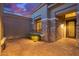 Inviting courtyard featuring stone accents, brick pavers, and secure gated access to the home's entrance at 22847 N 53Rd E St, Phoenix, AZ 85054