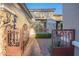 Inviting front entry with stone accents, custom wrought iron gate and well manicured landscape at 22847 N 53Rd E St, Phoenix, AZ 85054