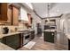 Gourmet kitchen showcasing custom cabinetry, stainless steel Viking appliances, granite countertops, and an open layout at 22847 N 53Rd E St, Phoenix, AZ 85054