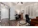 Well-appointed home office with hardwood floors, plantation shutters, and built-in desk at 22847 N 53Rd E St, Phoenix, AZ 85054