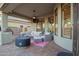 Covered patio with ample seating, outdoor entertainment, and easy access to backyard at 22847 N 53Rd E St, Phoenix, AZ 85054