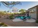 Inviting backyard pool area featuring desert landscaping and comfortable lounge chairs for relaxation and enjoying the serene outdoor space at 22847 N 53Rd E St, Phoenix, AZ 85054