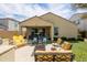 Landscaped backyard featuring patio seating and built in BBQ area at 24226 N 22Nd St, Phoenix, AZ 85024