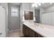 Bathroom with a large mirror, modern vanity, and shower at 24226 N 22Nd St, Phoenix, AZ 85024
