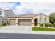 Charming single-Gathering home featuring a three-car garage, well-maintained landscaping, and tile roof at 24226 N 22Nd St, Phoenix, AZ 85024