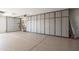 Well-organized garage featuring bike rack and built-in storage cabinets at 24226 N 22Nd St, Phoenix, AZ 85024
