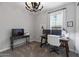 Office space with two desks, ample lighting, and neutral paint at 24226 N 22Nd St, Phoenix, AZ 85024