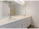 Bathroom featuring double sinks, vanity, and a large mirror at 25230 S Berry Brook Dr, Sun Lakes, AZ 85248