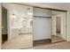 Mirrored closet showcasing a bathroom with double sinks and a vanity at 25230 S Berry Brook Dr, Sun Lakes, AZ 85248