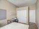 Bedroom featuring a closet, shelving, and neutral tones, offering a versatile and functional space at 25659 W Forest Grove Ave, Buckeye, AZ 85326