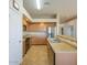 Bright kitchen with stainless steel appliances and wooden cabinets at 25659 W Forest Grove Ave, Buckeye, AZ 85326