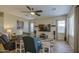 Comfortable living area features modern decor, natural light, and ample space for relaxing and entertaining at 25659 W Forest Grove Ave, Buckeye, AZ 85326