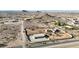 Expansive aerial view of the property, showcasing the unique home, detached garage, and surrounding desert landscape at 28758 N Ashbrook Ln, San Tan Valley, AZ 85144