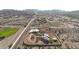 Wide aerial view of desert neighborhood featuring homes on multiple acres including baseball field and community center at 28758 N Ashbrook Ln, San Tan Valley, AZ 85144