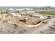 Expansive property featuring custom home, viewing tower, workshop, pool and spa surrounded by a unique perimeter wall at 28758 N Ashbrook Ln, San Tan Valley, AZ 85144