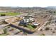 Custom home on a large lot featuring desert landscaping, pool, putting green, and unique perimeter wall at 28758 N Ashbrook Ln, San Tan Valley, AZ 85144