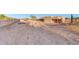 Aerial backyard view showcasing the pool, built-in trampoline and home's architecture at 28758 N Ashbrook Ln, San Tan Valley, AZ 85144