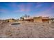 Spacious backyard with a pool and a trampoline at 28758 N Ashbrook Ln, San Tan Valley, AZ 85144