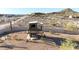 Backyard featuring large play structure including fort, slide, and ladder at 28758 N Ashbrook Ln, San Tan Valley, AZ 85144