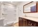 Bathroom with a white shower, granite sink and cabinets at 28758 N Ashbrook Ln, San Tan Valley, AZ 85144