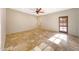 Bedroom with tiled floors, neutral walls, and ample natural light at 28758 N Ashbrook Ln, San Tan Valley, AZ 85144