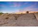 Desert landscaped property features a custom built structure on a hilltop at 28758 N Ashbrook Ln, San Tan Valley, AZ 85144