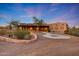 Stunning desert home featuring unique southwestern architectural design and mature landscaping at 28758 N Ashbrook Ln, San Tan Valley, AZ 85144