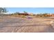 Southwestern home with a circular driveway and desert landscaping at 28758 N Ashbrook Ln, San Tan Valley, AZ 85144