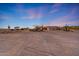 Expansive desert property featuring unique architectural details and low maintenance landscaping at 28758 N Ashbrook Ln, San Tan Valley, AZ 85144