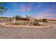 Beautiful southwestern home featuring desert landscaping and a circular driveway at 28758 N Ashbrook Ln, San Tan Valley, AZ 85144