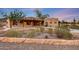 Beautiful southwestern home featuring desert landscaping and a circular driveway at 28758 N Ashbrook Ln, San Tan Valley, AZ 85144