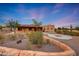 Beautiful southwestern home featuring desert landscaping and a circular driveway at 28758 N Ashbrook Ln, San Tan Valley, AZ 85144