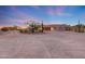 Expansive desert property featuring unique architectural details and cacti at 28758 N Ashbrook Ln, San Tan Valley, AZ 85144