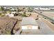 Aerial shot of a large detached garage with multiple bays and ample parking space at 28758 N Ashbrook Ln, San Tan Valley, AZ 85144