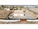 Aerial view of a detached garage, showcasing its size and ample parking with secure gated access at 28758 N Ashbrook Ln, San Tan Valley, AZ 85144