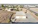 Aerial shot of a large detached garage with multiple bays and ample parking space at 28758 N Ashbrook Ln, San Tan Valley, AZ 85144