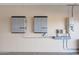 Garage walls with solar battery, electric panel, and utilities at 28758 N Ashbrook Ln, San Tan Valley, AZ 85144
