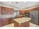 Updated kitchen boasting granite countertops, stainless steel appliances, and ample cabinet space at 28758 N Ashbrook Ln, San Tan Valley, AZ 85144
