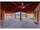 Large covered patio featuring ceiling fans at 28758 N Ashbrook Ln, San Tan Valley, AZ 85144