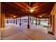 Covered patio with wood ceiling overlooking backyard pool, desert landscaping, and open air design at 28758 N Ashbrook Ln, San Tan Valley, AZ 85144