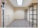Spacious storage room with wire shelving, skylight, and lighting fixtures at 28758 N Ashbrook Ln, San Tan Valley, AZ 85144