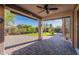 Gorgeous covered patio offering desert landscaping and an expansive backyard at 3055 N Red Mtn # 122, Mesa, AZ 85207